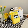 Cartoon school bus style children backpack in bright yellow with car wheel patterns - Yellow