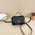 Minimalist black mini crossbody bag for girls with round gold buckle and smooth finish - Black