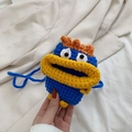 Handmade crochet monster crossbody bag for kids in vibrant blue and orange knit - Blue