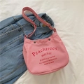 Pink canvas crossbody bag for kids with Peachtrees market text and adjustable strap - Pink