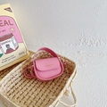 Pink mini crossbody handbag for girls with gold brand lettering and flap closure - Pink