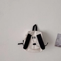 Cream canvas kids backpack featuring a cute black cartoon dog face and top handle - White