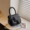 Mini black fashion handbag with textured heart embossing and golden chain strap - Black