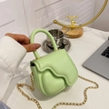Mini light green handheld chain bag for kids with heart decor and wavy flap detail - Green
