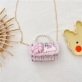 Pink tweed kids crossbody bag with pearl handle and floral charm in mini size - Pink