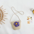 Mini yellow straw shoulder bag for girls featuring a cute purple fabric flower detail - Purple
