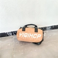 Bruinoranje cilindrische canvas tas met YIQIHCP-letteropdruk en zwarte handvatten - Khaki