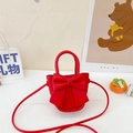Mini red crossbody bag with cute bowknot detail and a stylish top handle design - Red