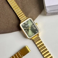 Detail of vintage square gold watch with green sunray dial and Roman numerals - Gold Case Green Dial