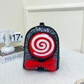 Cute black sequin toddler backpack with lollipop design and red bow detail - Black