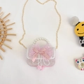 Bolso bandolera rosa de princesa con lazo de malla, asa de perlas y cadena dorada - Lazo / Rosa