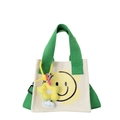 Borsa in tela per bambini con manici verdi, stampa smiley gialla e charm a fiore - Verde (senza ciondolo)