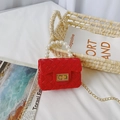 Red mini jelly bag for girls featuring pearl handle and golden chain strap - Red