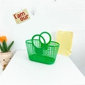 Vibrant green hollow plastic beach basket for girls with dual round handles for beach trips - Green
