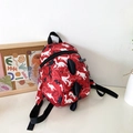 Zainetto rosso per bambini con stampa dinosauri e creste 3D nere decorative - Rosso