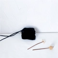 Faux fur mini crossbody bag in black plush finish with delicate shoulder strap - Black