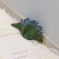 Cute green dinosaur crossbody bag for kids featuring blue scales and leather texture - Green