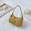 Kids mustard yellow faux leather baguette bag with heart pendant and round logo - Khaki