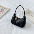 Mini black faux leather shoulder bag for kids with gold zipper and heart pendant - Black