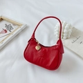 Mini red faux leather baguette handbag for kids with heart charm and embossed logo - Red