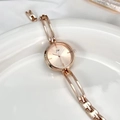 Elegant rose gold vintage-style women's watch with minimalist dial and chain bracelet - Rose Gold Rose Dial