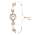 Elegant rose gold women's watch with rhinestone flower bracelet and Roman numerals - Rose Gold