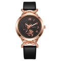 Detailed macro of vintage rose gold dial with intricate floral carving and gear accents - Black