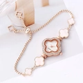 Elegante orologio da donna a bracciale in oro con quadrante bianco e ghiera di strass - Oro rosa