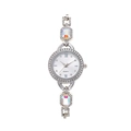 Detailed macro view of the silver quartz watch dial with encrusted crystals and gemstones - Silver White