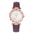 Detailed macro view of starfish dial with floral pattern and purple leather strap - Purple