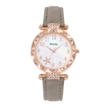 Dettaglio orologio al quarzo oro rosa con quadrante floreale e cinturino scamosciato - Grigio