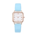 Detail of square rose gold watch case with marble dial and light blue leather strap - Sky Blue