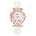 Detailed view of rose gold quartz watch with rhinestone bezel and white leather strap - White