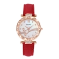 Detailed view of red frosted strap and rose gold watch case with crystal accents - Red