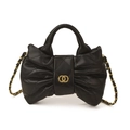 Quilted black bow handbag with gold chain strap and elegant metallic logo detail - Black