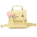 Zaino per bambini in pelle gialla a pois con ciondolo a cuore rosa e manico superiore - Giallo
