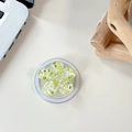 Detailed top view of 3D floral phone socket with green glitter floral patterns - Magnetic Macaron Sequin Sakura No. 9