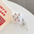 Detail view of glittery AirPods case featuring cherry prints and silver bow pendant - Glitter Silver Bead Pink Cherry With Pendant / AirPods 1/2 Gen