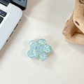 Detail of flower shaped phone grip with colorful sequins and blue resin finish - Sakura Holder Macaron Sequin No. 1