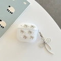Close-up of translucent glitter AirPods case with silver metal bow and pearl accents - AirPods 1/2 Gen / Silver Bead French Bow-With Pendant
