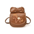 Bruine mini schoudertas voor kinderen van kunstleer met strik en pony borduursel - Bruin