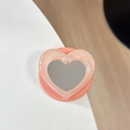 Dettaglio del supporto per telefono a cuore con specchio per trucco e finitura glitter - Specchio Cuore Perlato-Arancione