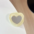 Detail of cream yellow heart-shaped phone grip with glitter edge and integrated mirror - Pearl Heart Mirror-Yellow
