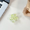 Macro detail of 3D resin flower phone grip with green sequins and magnetic base - Sakura Holder Macaron Sequin No. 9