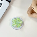 Macro shot of 3D sequin floral phone socket with green and yellow petal fragments - Magnetic Macaron Sequin Sakura No. 6