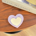 Close-up of heart-shaped glitter phone socket with a mirror on a rustic wooden desk - Heart Mirror Stand / Pearl Purple