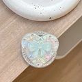 Dettaglio del supporto per telefono a cuore laser con finitura iridescente e fiocco - (Strass Bianco) Magnetico - Cuore di Conchiglia - Fiocco di Gelatina / Blu