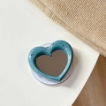 Detail of blue heart-shaped MagSafe phone mirror grip on a soft knitted background - Magnetic Heart Mirror Ink Splash-Navy Blue