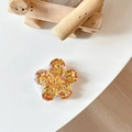 Detail of flower phone grip featuring sparkling yellow sequins in clear resin - Sakura Grip - Colorful Sequins No.15