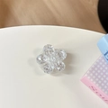 Dettaglio del supporto per telefono a forma di fiore in acrilico trasparente glitterato - Supporto Ciliegio - Paillettes ad Alta Lucentezza / Bianco
